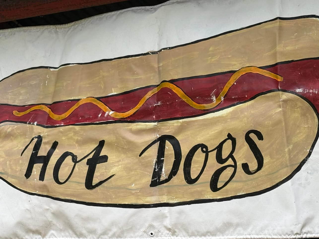 Easter Carnival Bingo 2026 - Hot Dogs sign