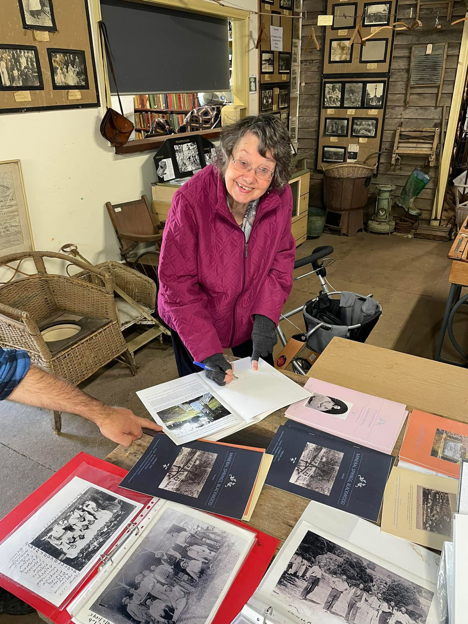 Margot Hitchcock signing books at the Blackwood museum open day